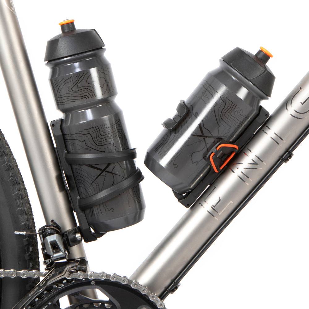 Restrap side release bottle cage - sivusta ladattava pulloteline