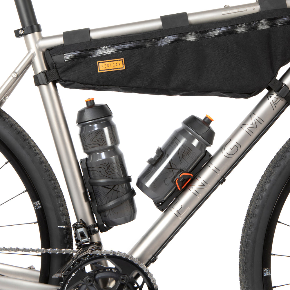 Restrap side release bottle cage - sivusta ladattava pulloteline