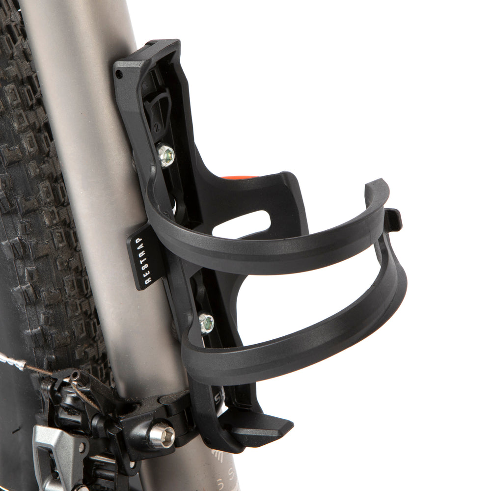 Restrap side release bottle cage - sivusta ladattava pulloteline