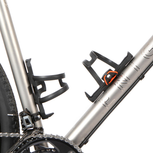 Restrap side release bottle cage - sivusta ladattava pulloteline